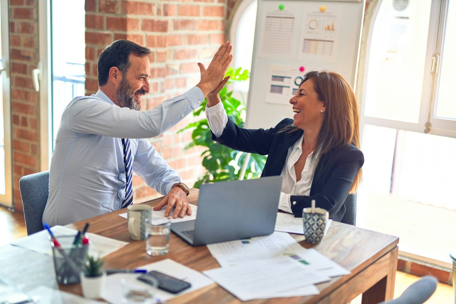 Financial advisors collaborating on a client plan